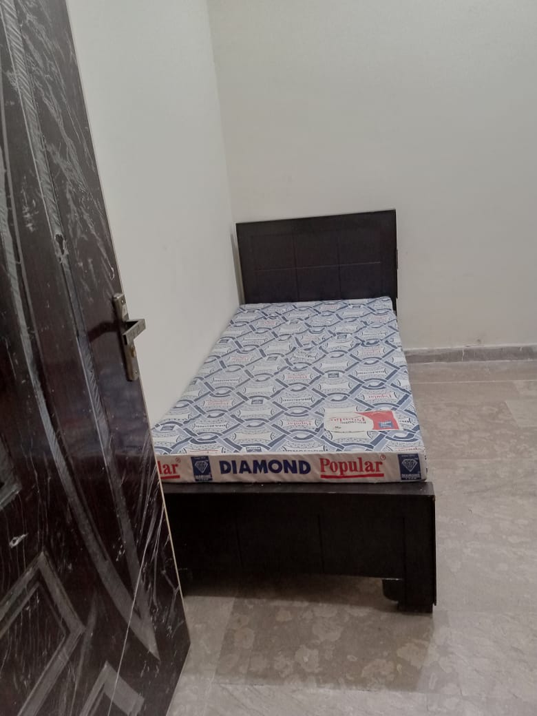 Two Seater Room at The Second Home Boys Hostel Lahore